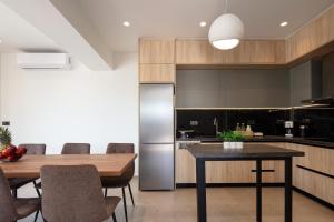 Η κουζίνα ή μικρή κουζίνα στο Oasis Serenity