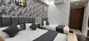 Postel nebo postele na pokoji v ubytování Hotel allen