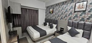 TV a/nebo společenská místnost v ubytování Hotel allen