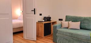 Postel nebo postele na pokoji v ubytování Vittore Gambello Rooms