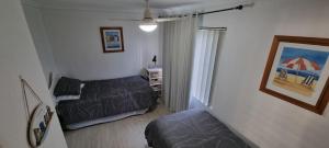 Postel nebo postele na pokoji v ubytování The Poplars, 2,36 Magnus Street - Comfortable Unit With Air Conditioning and Wi-Fi + 23 fotografií