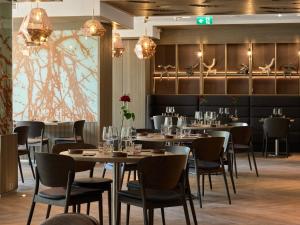 Um restaurante ou outro lugar para comer em Nordic Hotel Forum