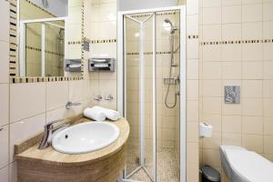 Koupelna v ubytování Wellness Hotel Astra