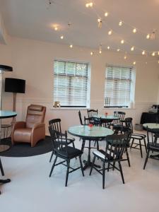 Et opholdsområde på Boutique hotel MEŅĢELES PIENOTAVA