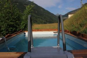 a swimming pool with a stairway leading up to a pool at Casa Gialla in Russo
