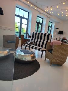 Et opholdsområde på Boutique hotel MEŅĢELES PIENOTAVA