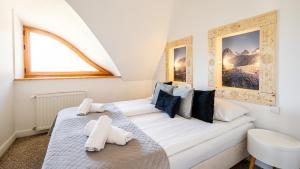 Posteľ alebo postele v izbe v ubytovaní Aparthotel Delta Boutique