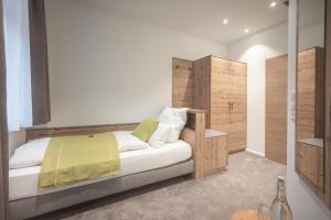 Postel nebo postele na pokoji v ubytování Hotel dasZimmermann