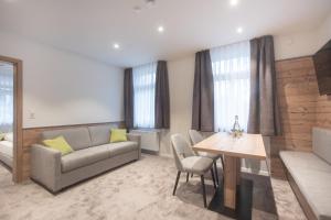 Posezení v ubytování Hotel dasZimmermann