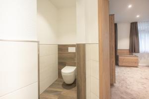 Koupelna v ubytování Hotel dasZimmermann