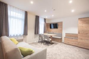 TV a/nebo společenská místnost v ubytování Hotel dasZimmermann