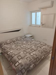 Postel nebo postele na pokoji v ubytování Go Exchange, Block D, Apt 6 Entire Unit
