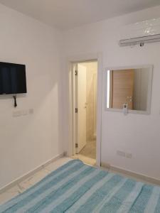 Postel nebo postele na pokoji v ubytování Go Exchange, Block D, Apt 6 Entire Unit