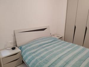 Postel nebo postele na pokoji v ubytování Go Exchange, Block D, Apt 6 Entire Unit