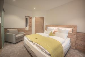 Postel nebo postele na pokoji v ubytování Hotel dasZimmermann