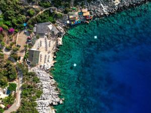 an aerial view of a beach and the water at Aquarius Hotel in Kaş