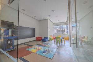 Et tv og/eller underholdning på Apt with Reforma View Pool and Jacuzzi