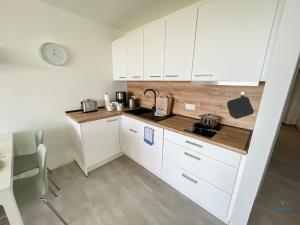 Η κουζίνα ή μικρή κουζίνα στο Kugelbakeblick 51 +9 φωτογραφίες