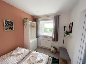 Ένα ή περισσότερα κρεβάτια σε δωμάτιο στο Kugelbakeblick 51