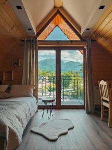 Postel nebo postele na pokoji v ubytování Willa Niezapominajka