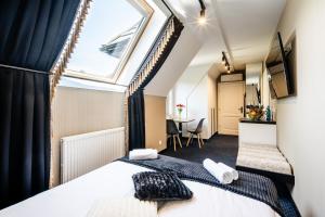 Posteľ alebo postele v izbe v ubytovaní Aparthotel Diamond SPA Family + 37 fotografií