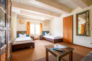 Postel nebo postele na pokoji v ubytování Hotel Stadtgut