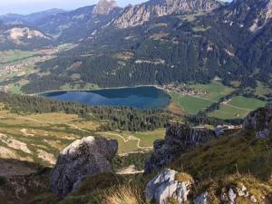 a view of a mountain valley with a lake at Haus Rosemarie in Nesselwängle