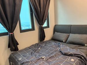 Postel nebo postele na pokoji v ubytování Sky Suite Meritus Residence in Perai