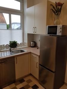 Kuchyň nebo kuchyňský kout v ubytování Armonia