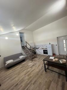 a room with a bunk bed and a desk at Gîte1 pour 6 personnes in Anneyron