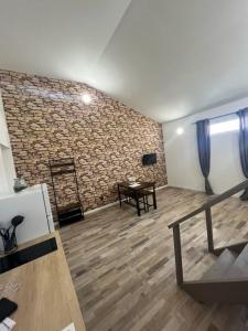 TV a/nebo společenská místnost v ubytování Gîte1 pour 6 personnes + 21 fotografií