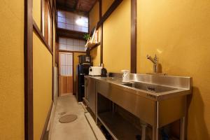 Koupelna v ubytování 宮島 町家宿 進龍庵