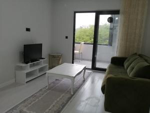 TV a/nebo společenská místnost v ubytování AhmetsS Home
