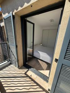 a room with a window with a bed in it at VillaGassin 403 - Luxury Villa with Private Pool near Saint-Tropez-Airco-parking in Saint-Tropez
