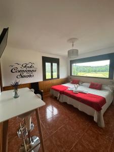 Ein Bett oder Betten in einem Zimmer der Unterkunft Casa Blanco Conde