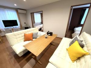 TV a/nebo společenská místnost v ubytování Peaks Home101
