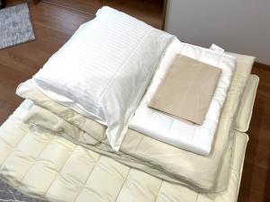 Postel nebo postele na pokoji v ubytování Peaks Home101