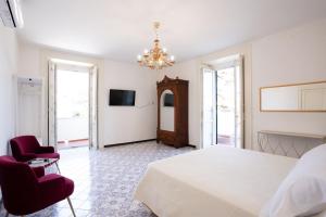 TV a/nebo společenská místnost v ubytování Casa Enzina