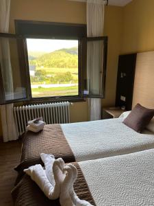 Ein Bett oder Betten in einem Zimmer der Unterkunft Casa Blanco Conde