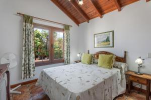 Ένα ή περισσότερα κρεβάτια σε δωμάτιο στο Casa La Molineta +31 φωτογραφίες