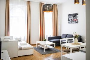 Posedenie v ubytovaní Real Apartments Révay