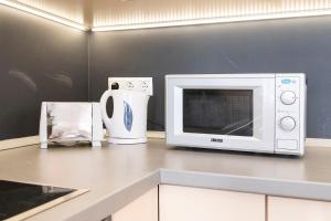 Kuchyňa alebo kuchynka v ubytovaní Real Apartments Révay