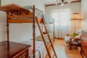 Ένα ή περισσότερα κρεβάτια σε δωμάτιο στο Casa al Ponte Aurisina