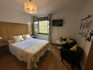 Ein Bett oder Betten in einem Zimmer der Unterkunft Casa Blanco Conde