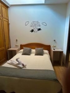 Ein Bett oder Betten in einem Zimmer der Unterkunft Casa Blanco Conde