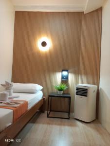 Postel nebo postele na pokoji v ubytování Airport Hostel Manila