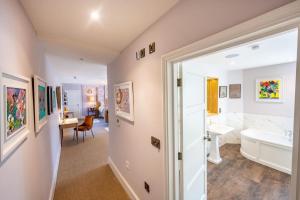 a bathroom with a tub and a sink and a toilet at The Assembly House in central Norwich in Norwich +152 photos