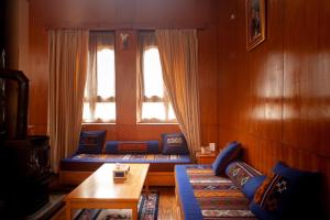 Posezení v ubytování Hotel Ugyenling