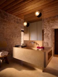 A bed or beds in a room at Argos in Cappadocia