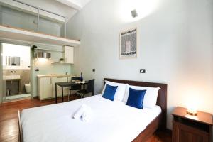 Postel nebo postele na pokoji v ubytování Maison Dante - Smart stays